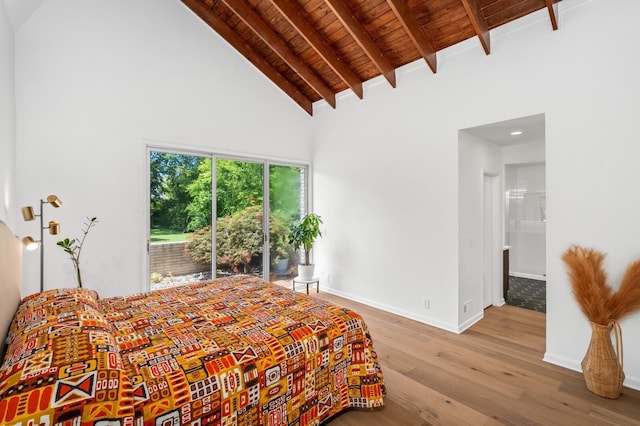 bedroom featuring ensuite bathroom, high vaulted ceiling, beamed ceiling, wood ceiling, and light hardwood / wood-style flooring