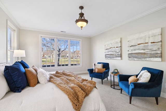 bedroom with multiple windows, crown molding, and carpet