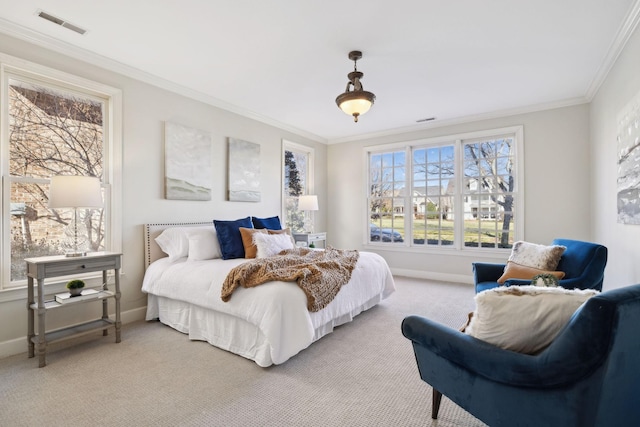 bedroom featuring crown molding and carpet floors