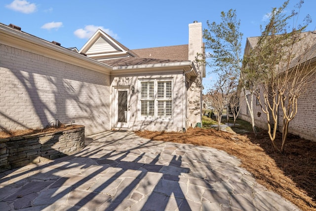 exterior space with a patio area