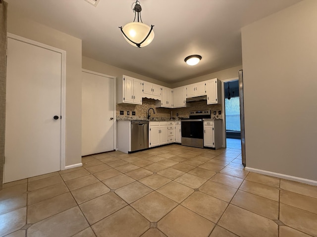 kitchen featuring sink, white cabinetry, hanging light fixtures, stainless steel appliances, and backsplash