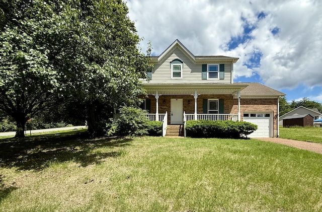 traditional-style home featuring a garage, covered porch, brick siding, driveway, and a front yard