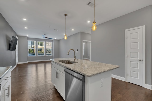 kitchen with stainless steel dishwasher, a kitchen island with sink, sink, and white cabinets