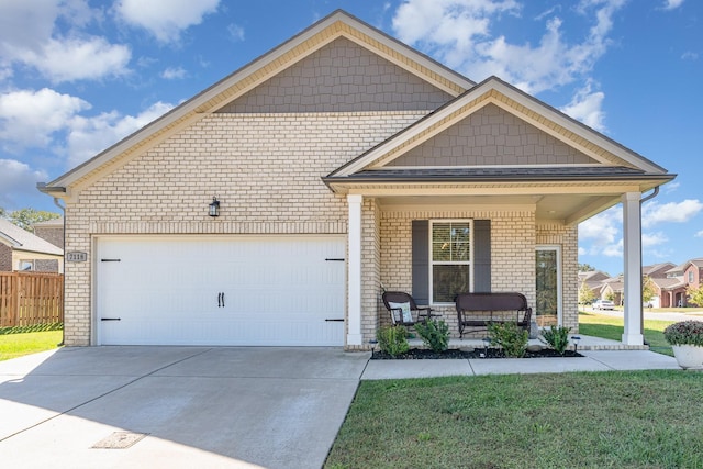 view of front of property with covered porch and a front lawn