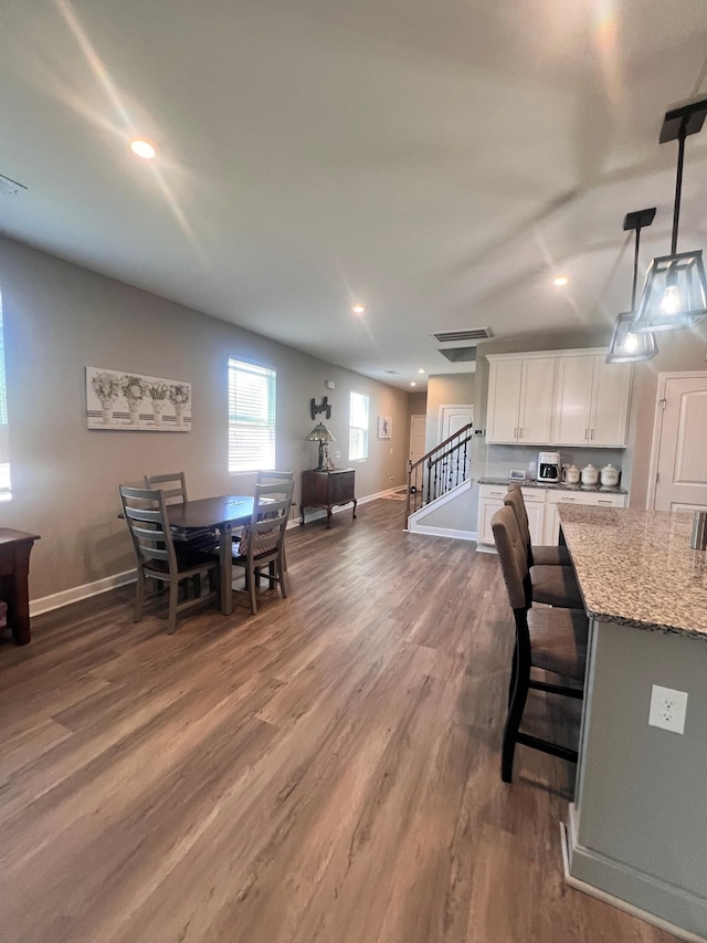 dining room featuring hardwood / wood-style flooring