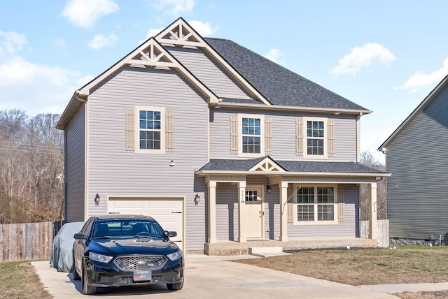 view of front of house featuring a garage and covered porch