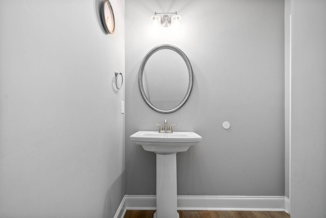 bathroom featuring hardwood / wood-style floors and sink