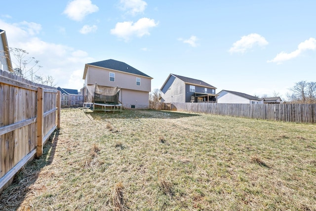 view of yard with a trampoline