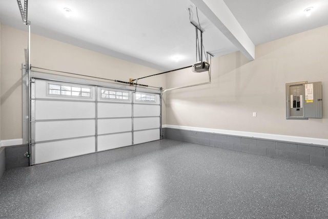 garage featuring a garage door opener and electric panel