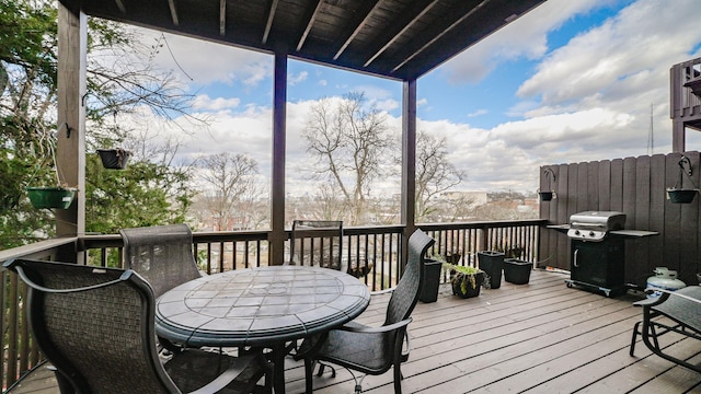 wooden terrace with area for grilling