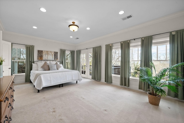 bedroom featuring crown molding, light colored carpet, french doors, and access to outside