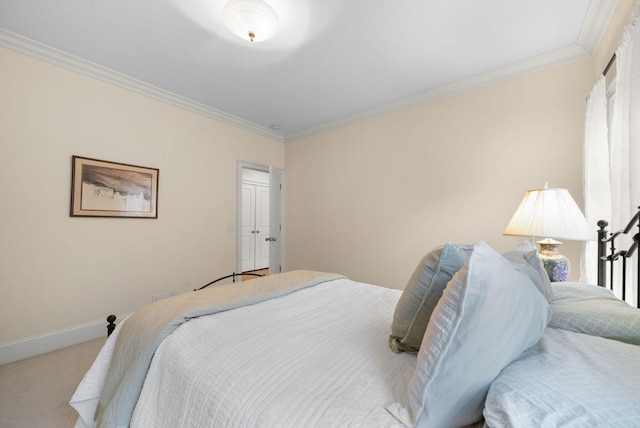 bedroom featuring ornamental molding and light colored carpet