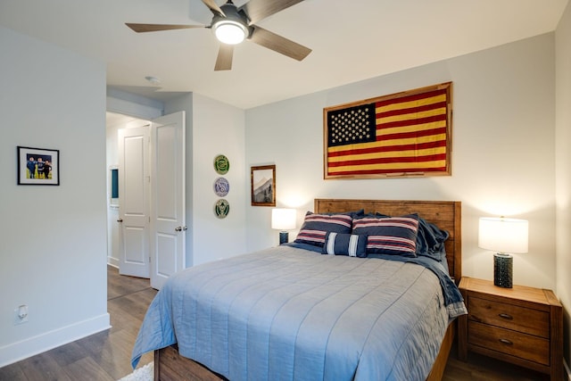 bedroom featuring hardwood / wood-style flooring and ceiling fan