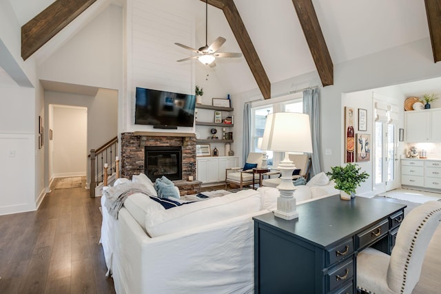 living room with beam ceiling, high vaulted ceiling, dark hardwood / wood-style floors, and a fireplace