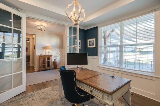 office space with ornamental molding, dark hardwood / wood-style floors, and a chandelier