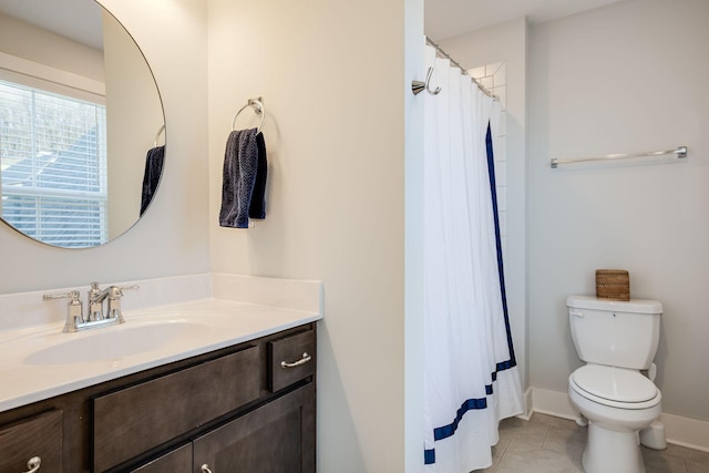 bathroom with vanity, a shower with shower curtain, tile patterned floors, and toilet