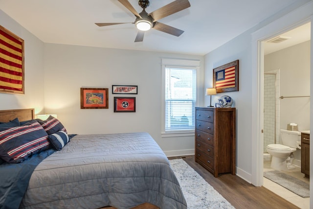 bedroom featuring ceiling fan, connected bathroom, and light wood-type flooring