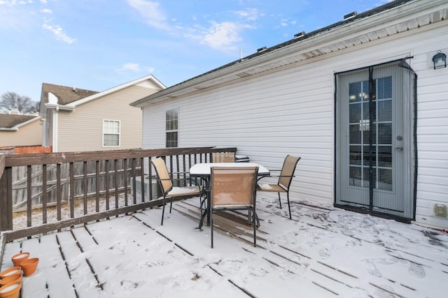 view of snow covered deck