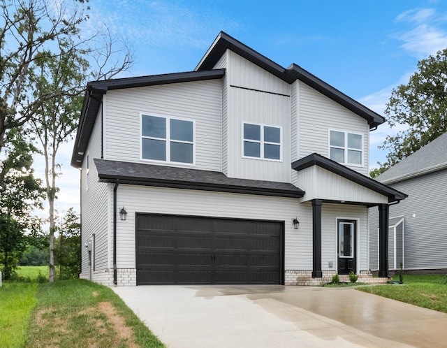 view of front of home with a garage