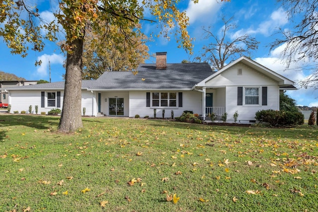 ranch-style home with a front yard