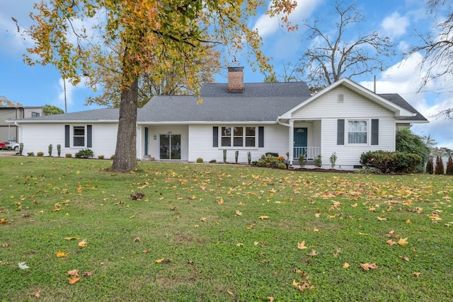 single story home with a front lawn