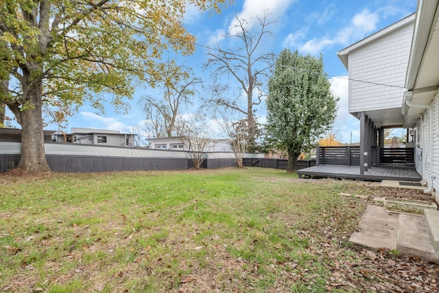 view of yard featuring a wooden deck