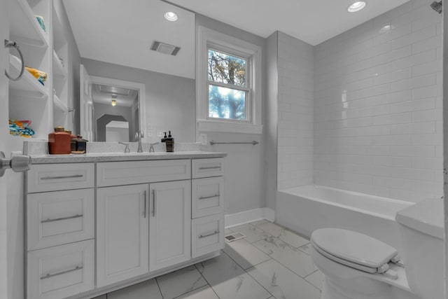 full bathroom featuring shower / bath combination, vanity, and toilet