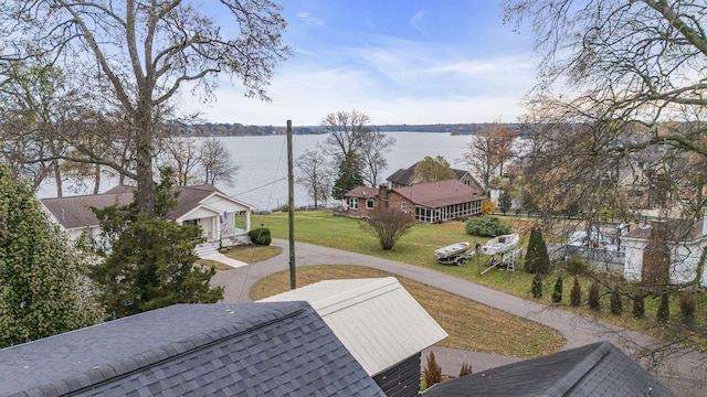 exterior space with a water view