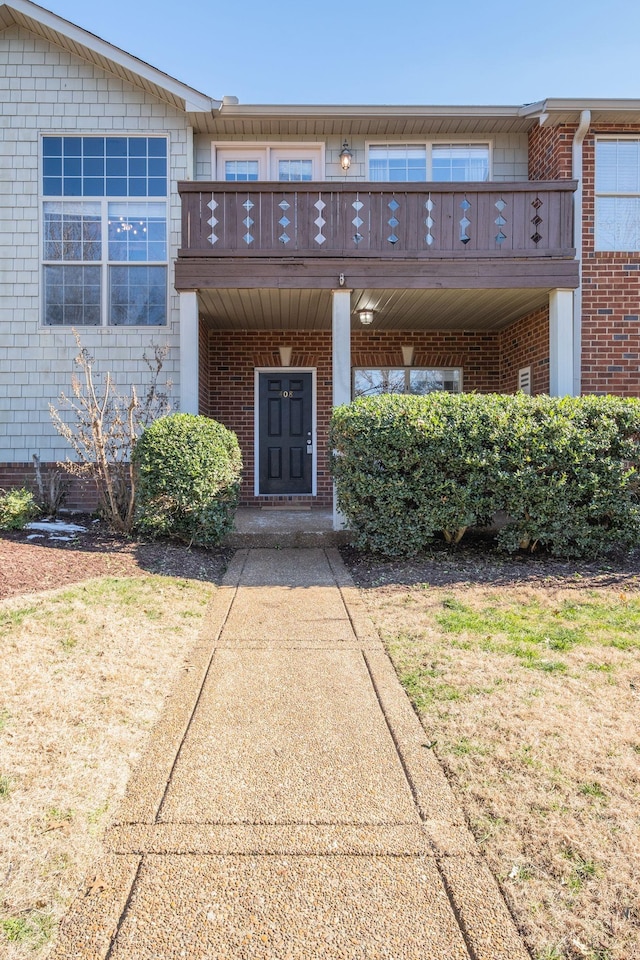 doorway to property featuring a balcony