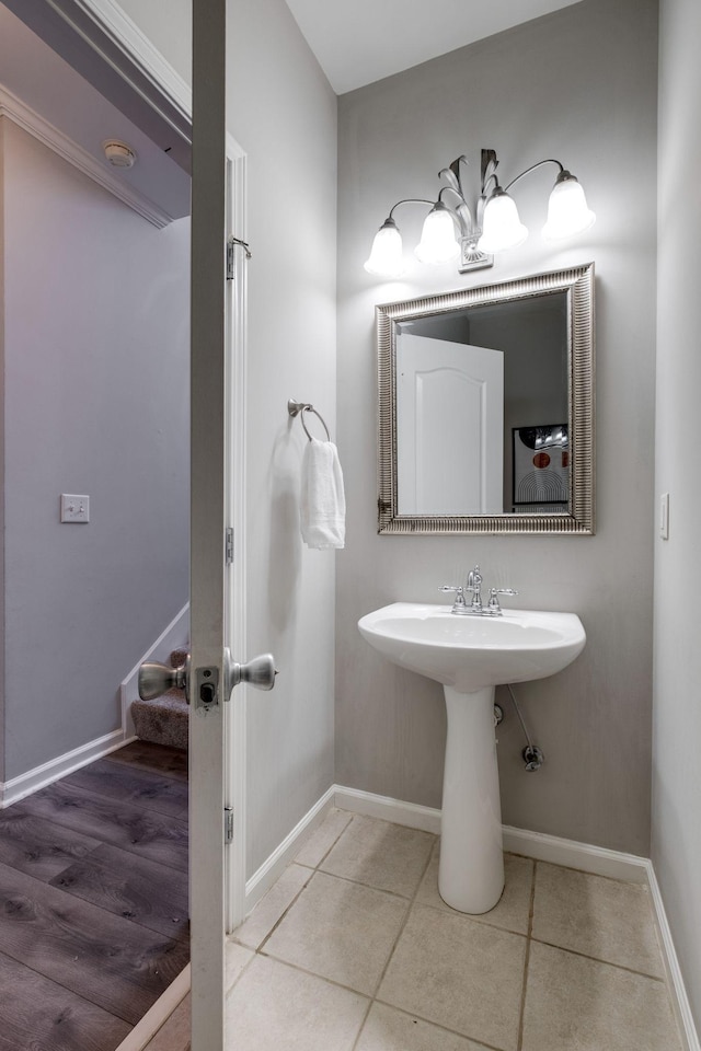 bathroom with sink and tile patterned flooring