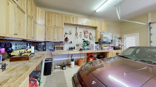 garage featuring a workshop area