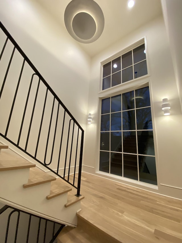 staircase featuring hardwood / wood-style floors