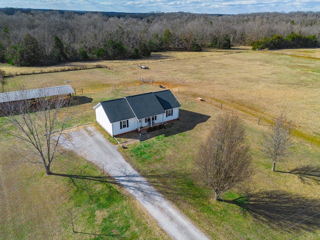 birds eye view of property featuring a rural view