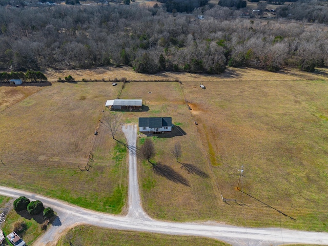 birds eye view of property featuring a rural view