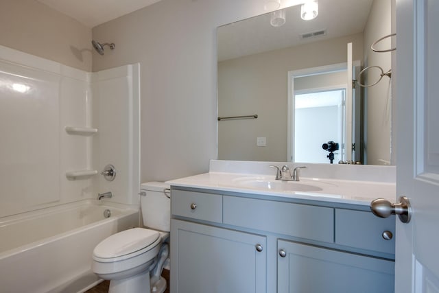 full bathroom with vanity, bathtub / shower combination, and toilet