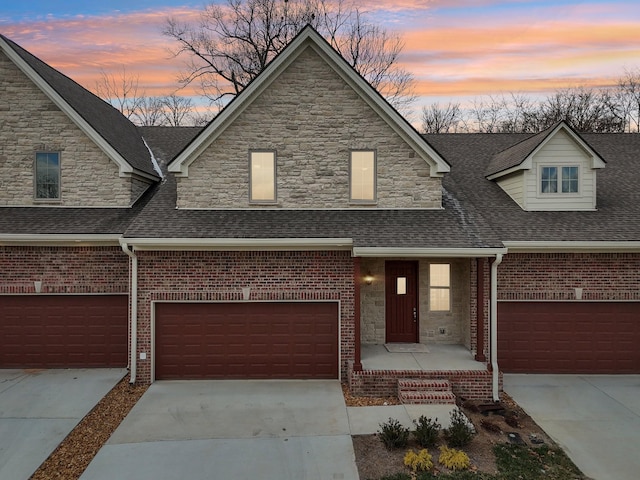 view of front of property with a garage