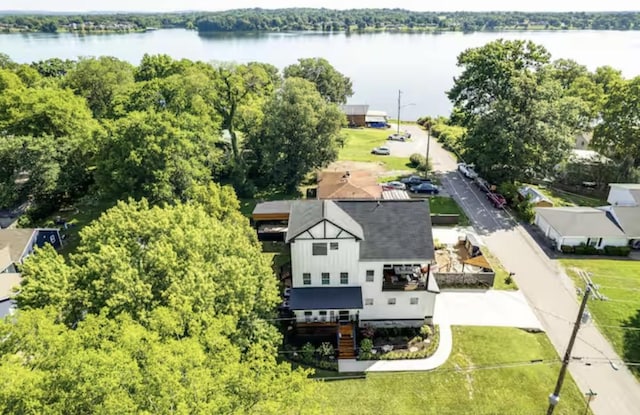 birds eye view of property featuring a water view