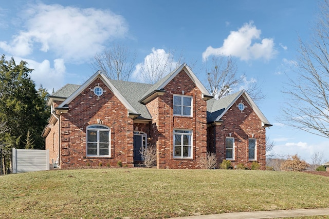 front facade featuring a front lawn