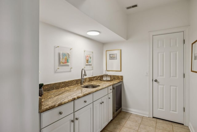 bathroom featuring vanity and tile patterned floors