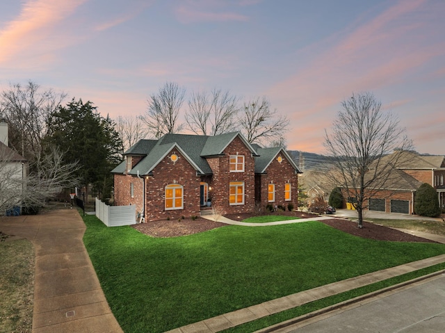 view of front facade with a lawn