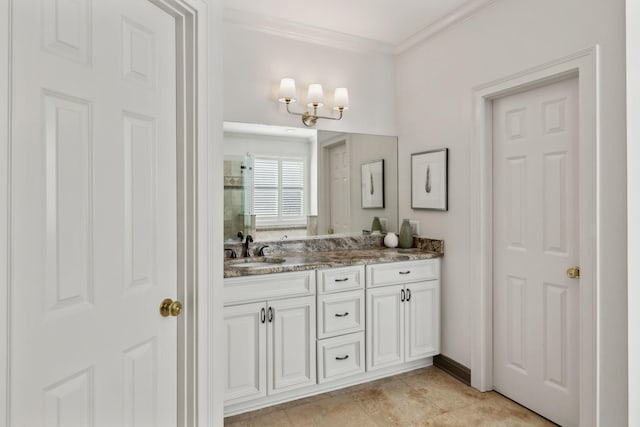 bathroom featuring vanity, tile patterned flooring, and ornamental molding