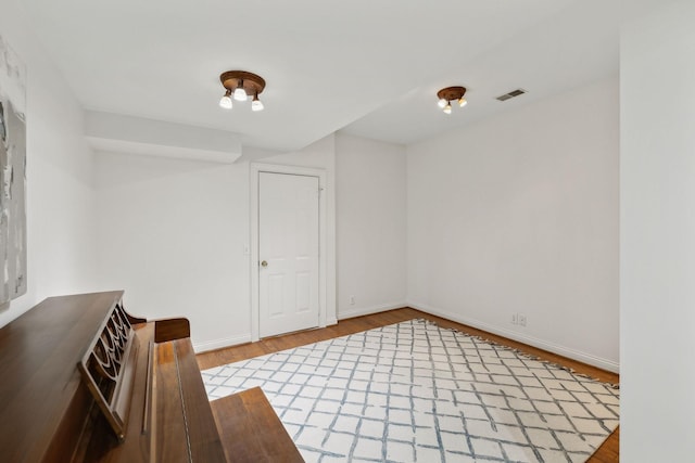 unfurnished room featuring hardwood / wood-style floors