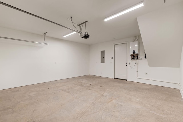 garage featuring tankless water heater, a garage door opener, and electric panel