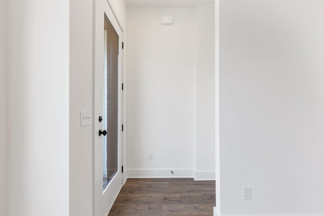 hallway featuring dark hardwood / wood-style flooring