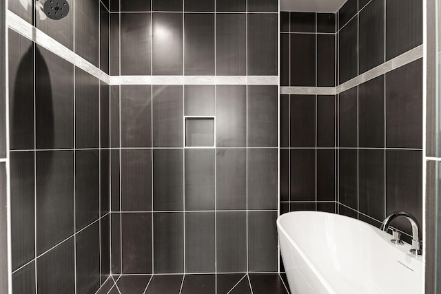 bathroom with independent shower and bath and tile walls