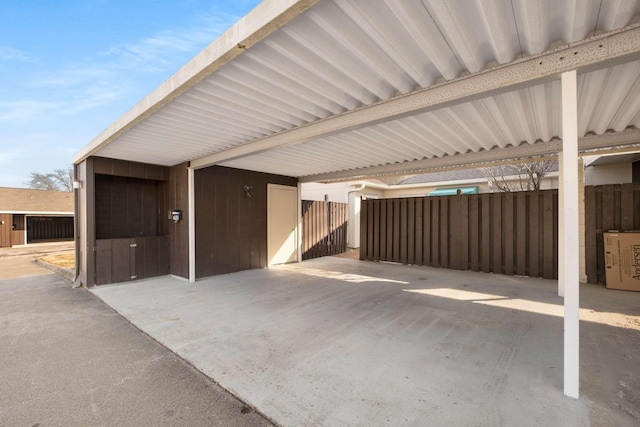 garage featuring fence