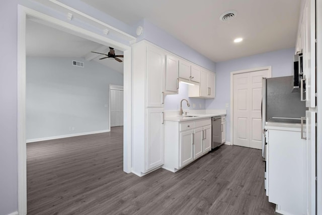 kitchen featuring dishwasher, dark wood-style flooring, visible vents, and white cabinetry