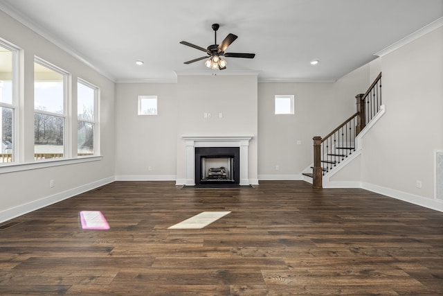 unfurnished living room featuring ornamental molding, dark hardwood / wood-style floors, and ceiling fan