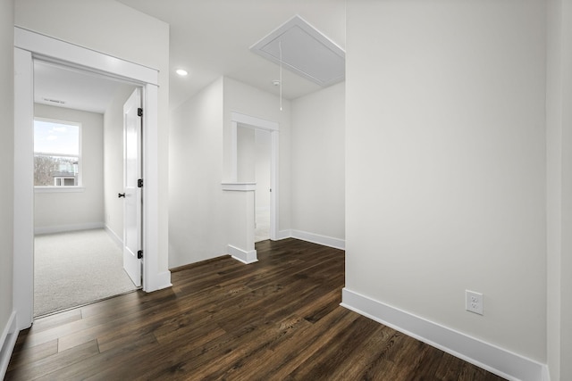 hall with dark hardwood / wood-style floors