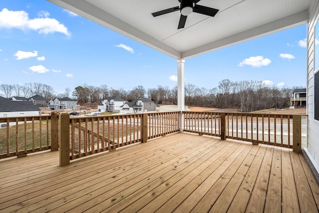 wooden deck with ceiling fan